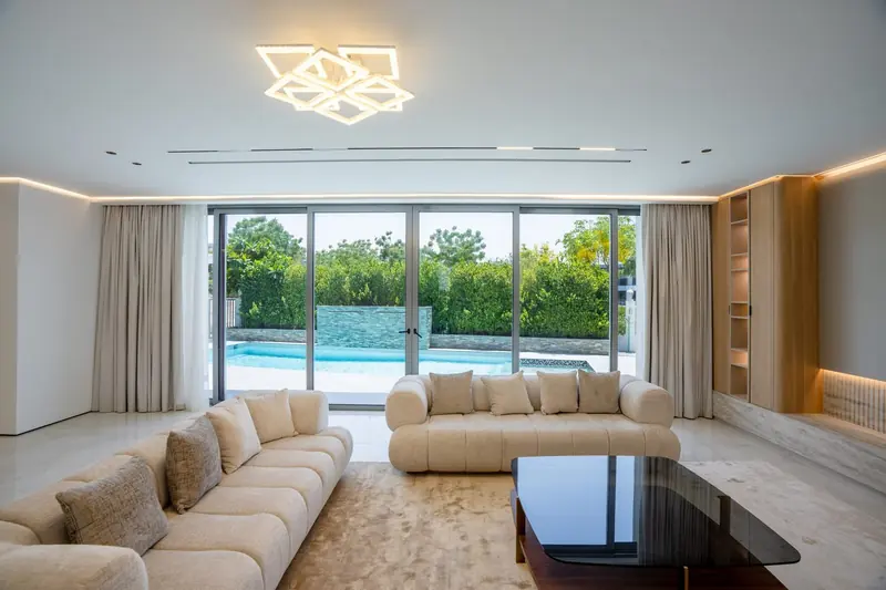 Living room with pool view